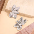 Boucles d’oreilles demi fleur argenté - Acier Inoxydable