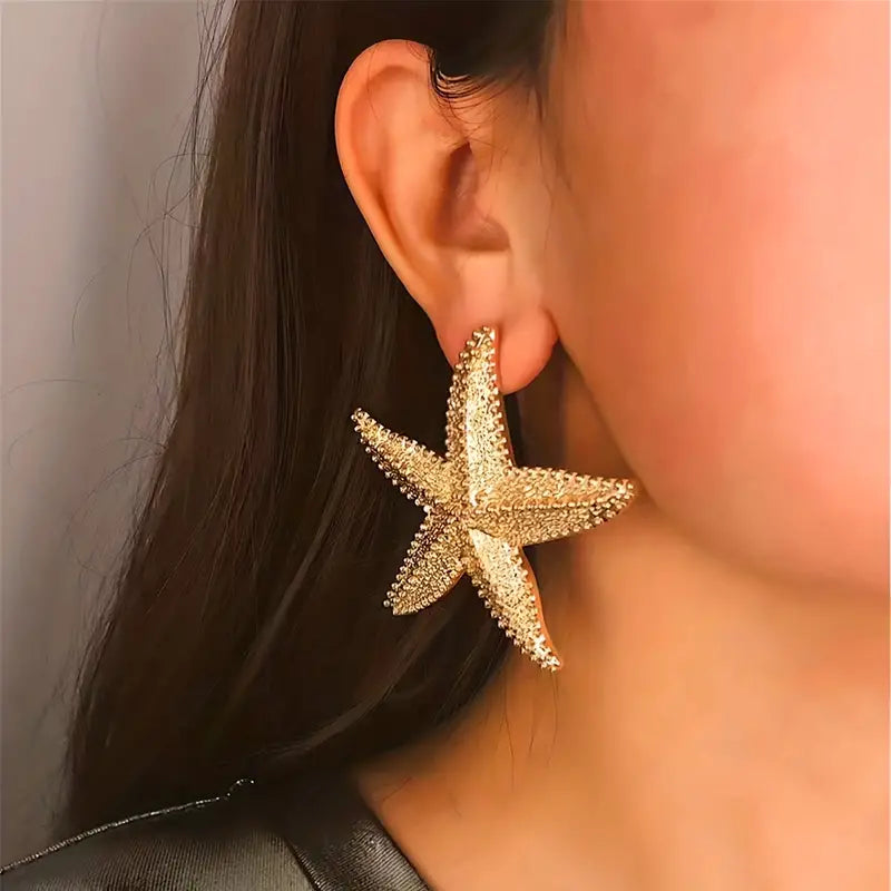 Boucles d’oreilles étoile de mer doré - acier inoxydable