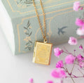 Collier médaillon - livre photo