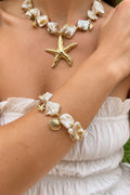 Bracelet coquillage bleu ou beige - acier inoxydable