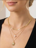 Collier triple chaîne soleil doré - acier inoxydable
